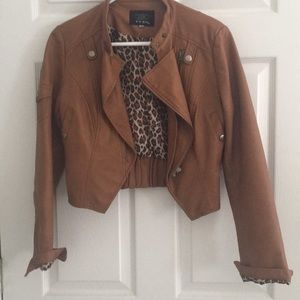 Brown faux leather jacket with the leopard lining